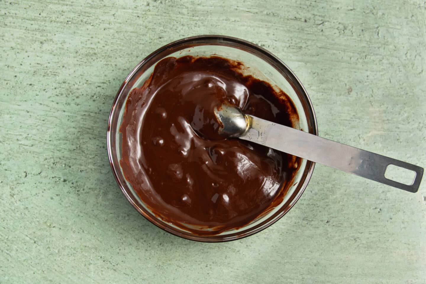 This is a picture of a bowl of melted chocolate.