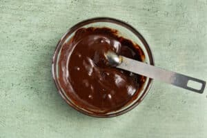 This is a picture of a bowl of melted chocolate.