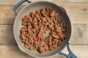 This is a picture of ground beef cooking in a skillet.