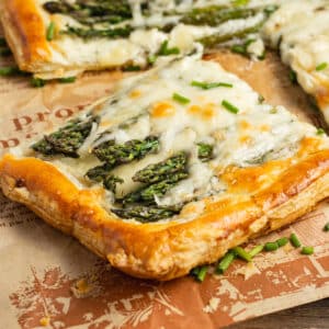 This is a picture of a slice of asparagus tart with Boursin.