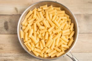 This is a picture of cooked pasta in a skillet.