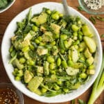 This is a picture of a bowl of edamame cucumber salad.