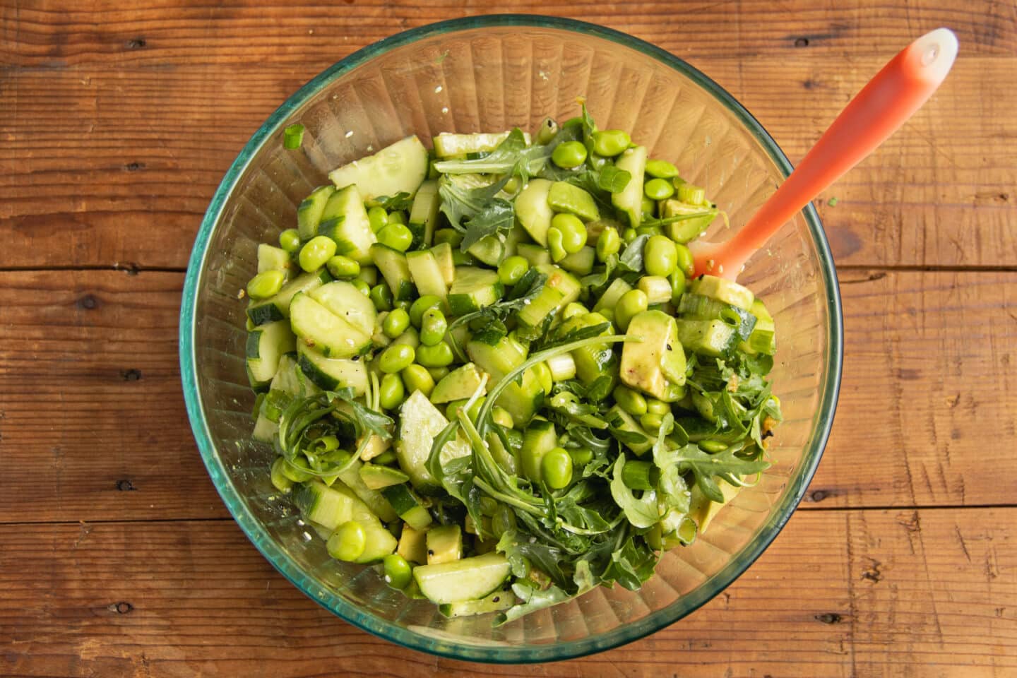 This is a picture of the salad in a bowl with the dressing added.