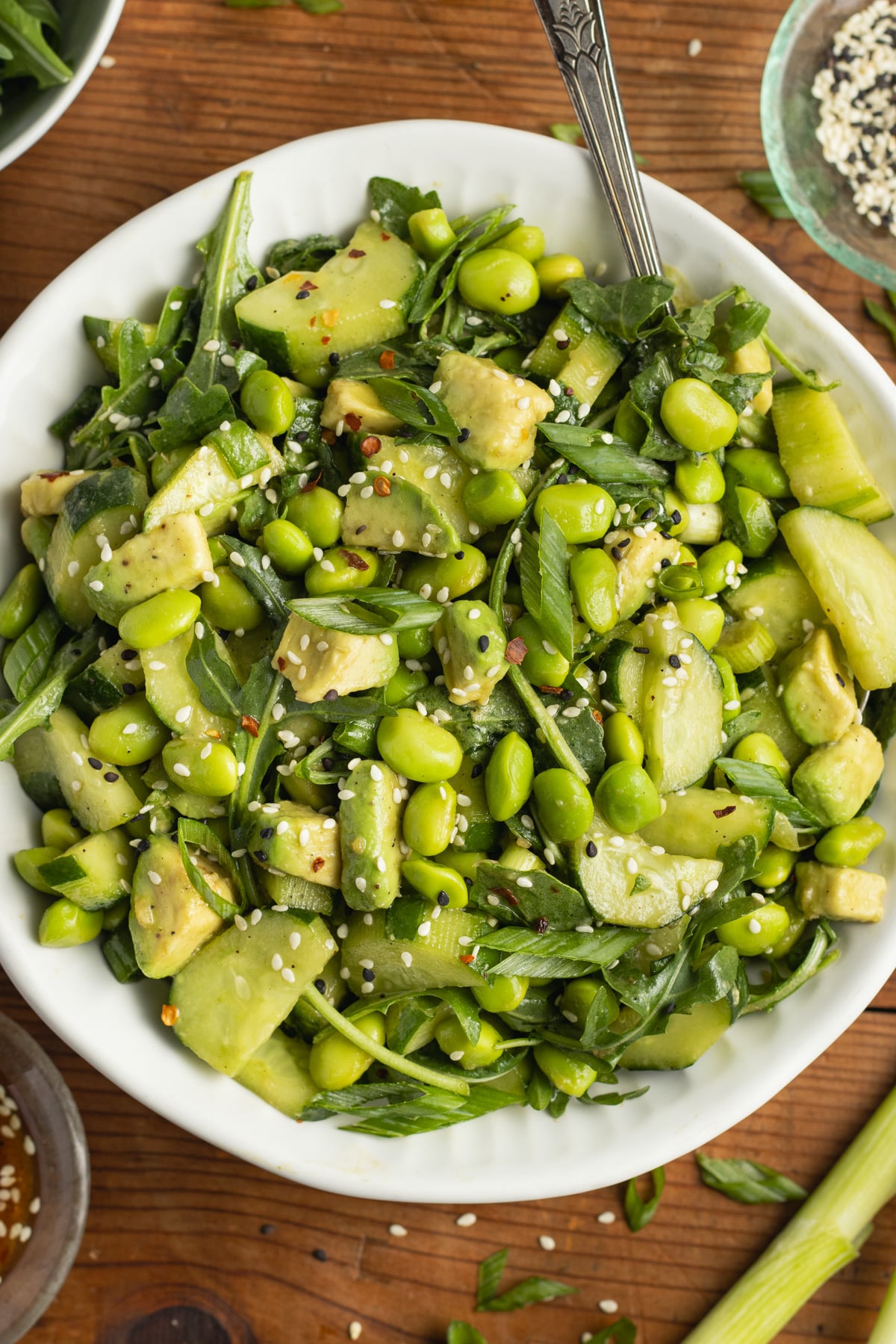 This is a picture of a bowl of edamame cucumber salad.