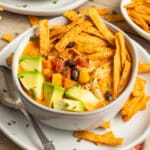 This is a picture of a bowl of creamy chicken tortilla soup.