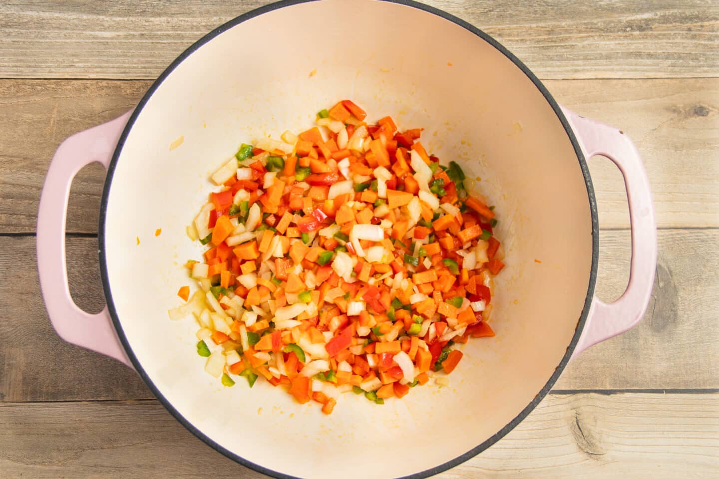 This is a picture of a pot with veggies cooking.