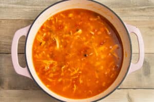 This is a picture of a pot with broth added.