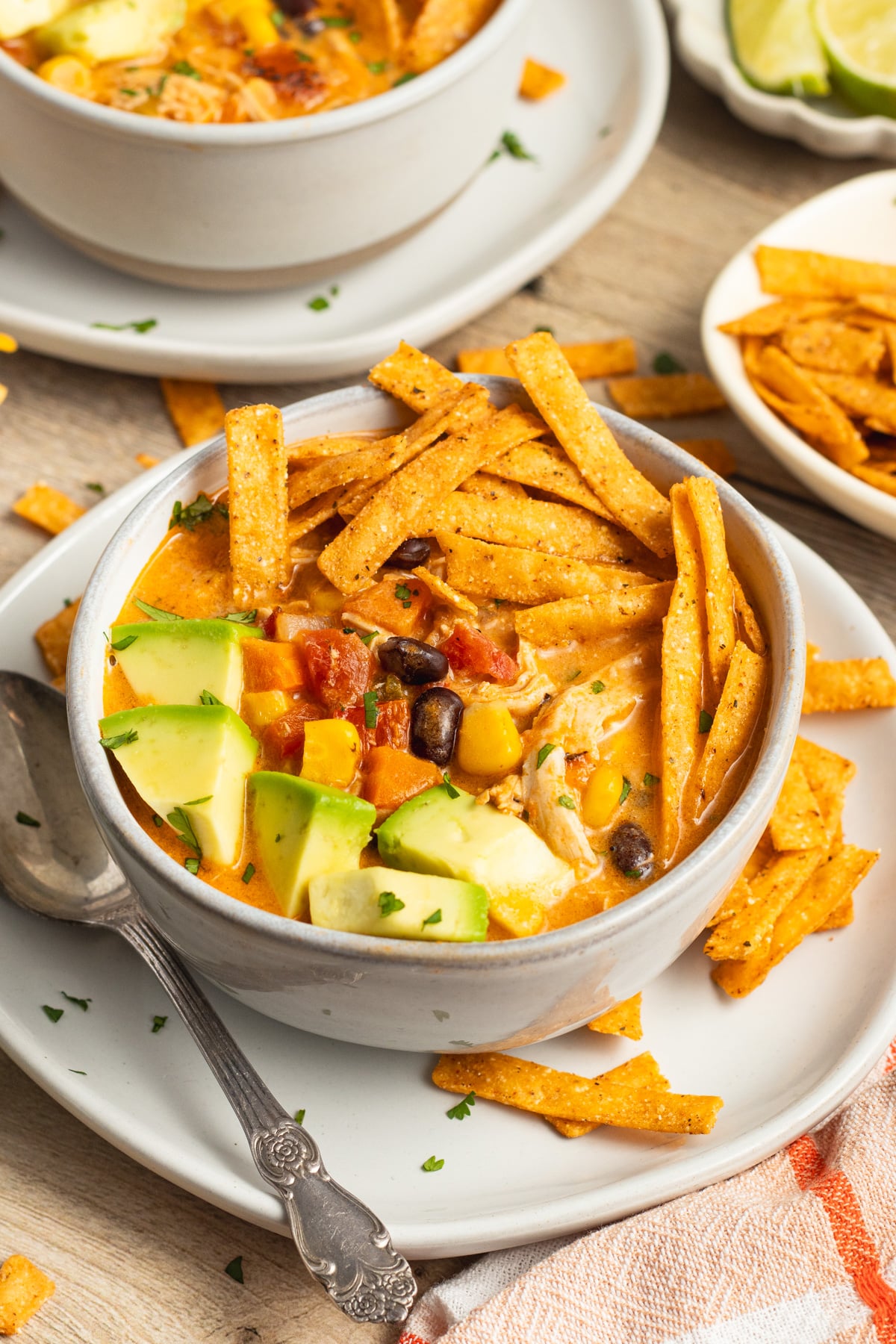 This is a picture of a bowl of creamy chicken tortilla soup.