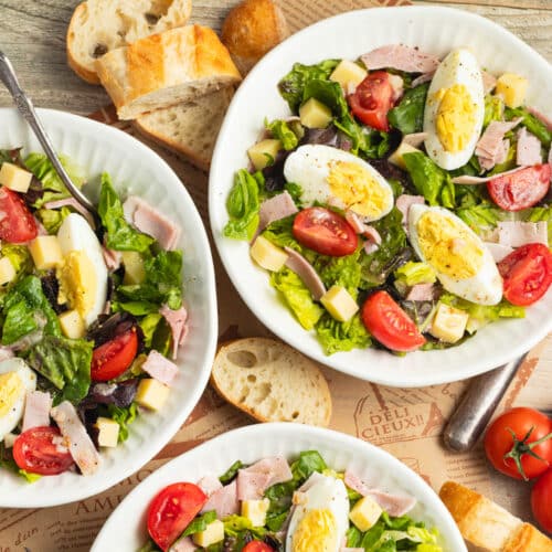 This is a picture of plates of French bistro salad.