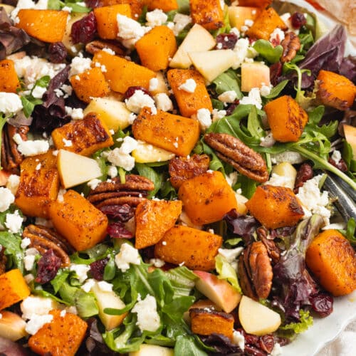 This is a picture of a plate of butternut squash feta salad.