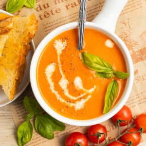 This is a picture of a bowl of roasted garlic tomato soup.