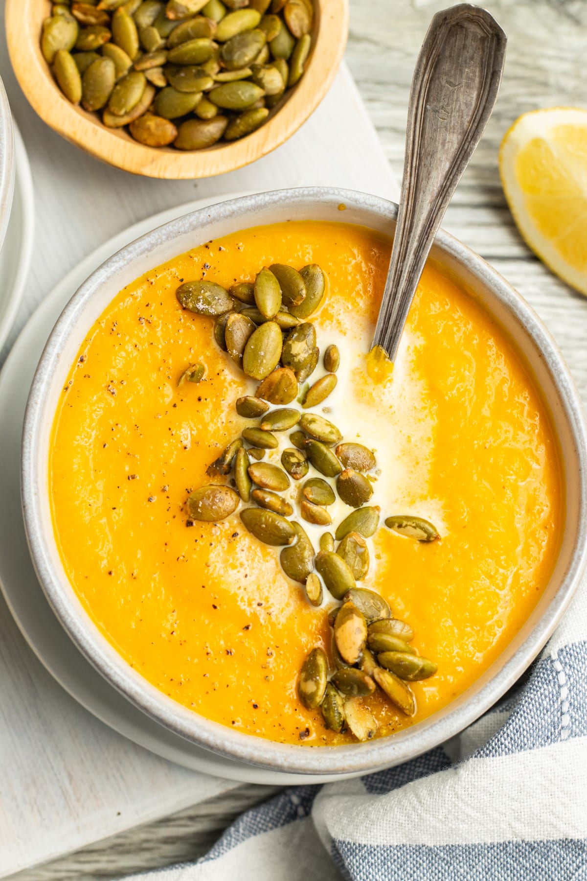 This is a picture of a bowl of cauliflower carrot soup.
