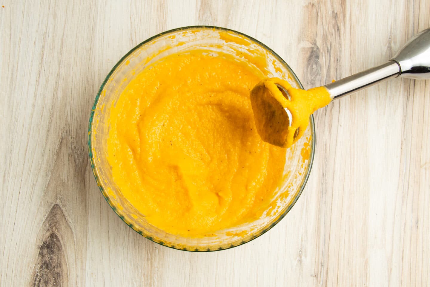 This is a picture of the cooked butternut squash being blended smooth.