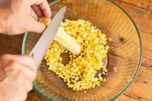 This is a picture of the corn being cut off the cob.