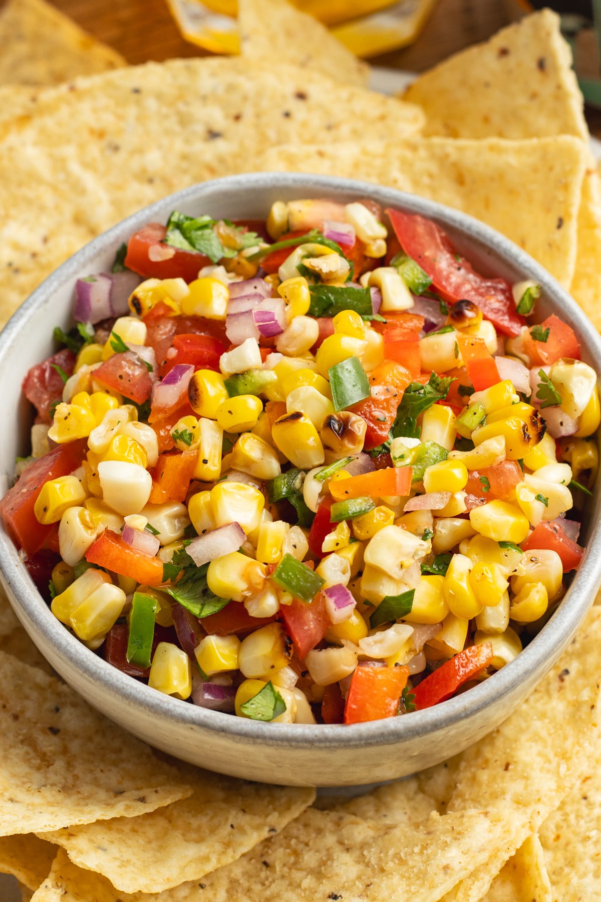 This is a picture of a bowl of grilled corn pico de gallo.