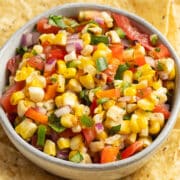This is a picture of a bowl of grilled corn pico de gallo.