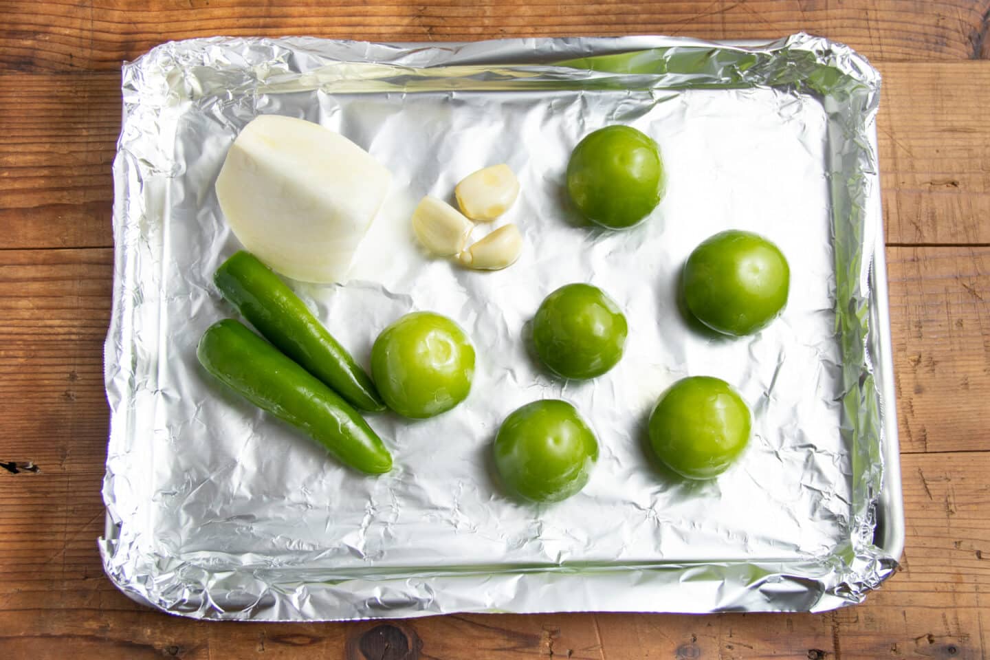 This is a picture of the veggies on a tray before being roasted.