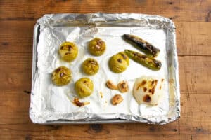 This is a picture of the veggies on a tray after being roasted.
