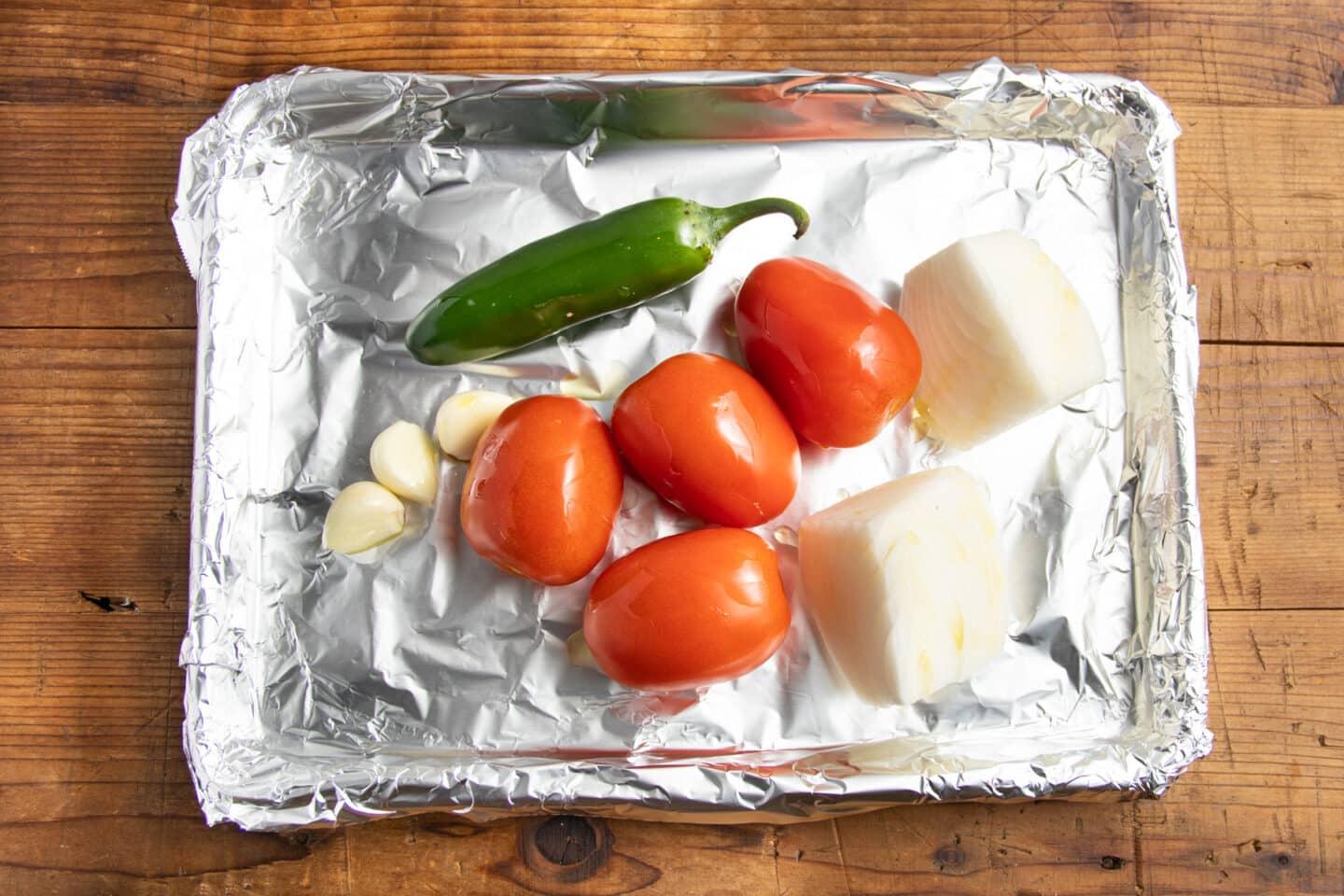 This is a picture of the veggies on a baking sheet before roasting.