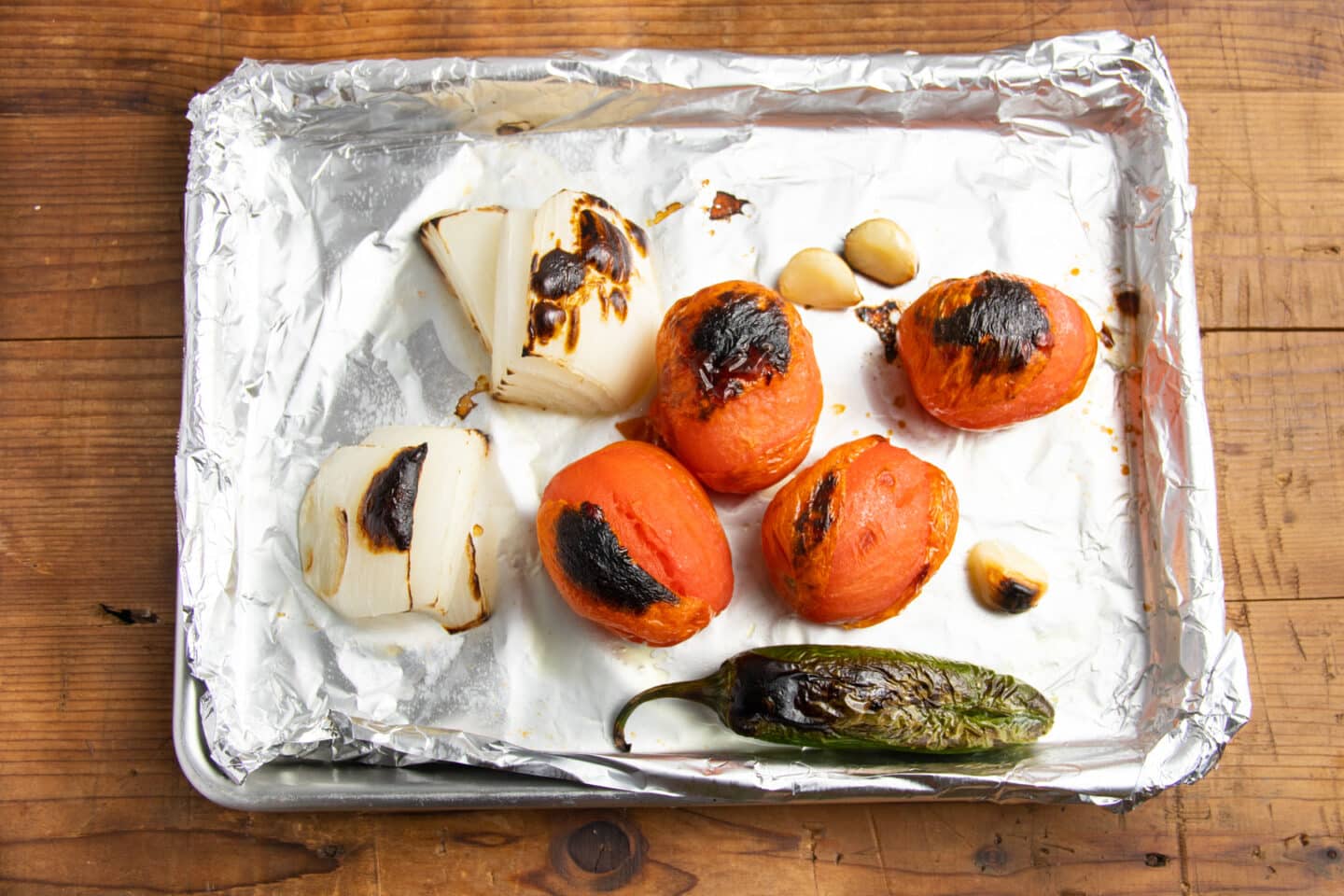 This is a picture of the veggies on a baking sheet after roasting.