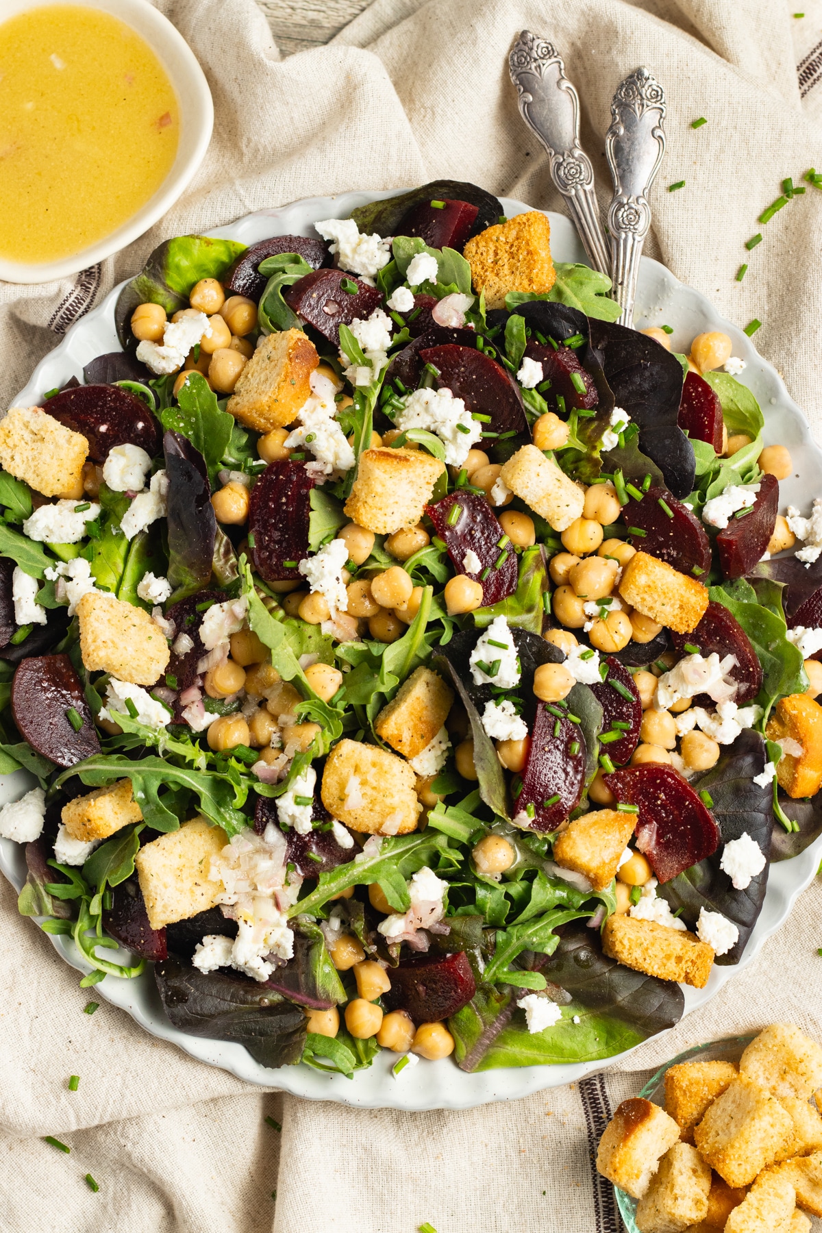 This is a picture of a plate of beet chickpea salad.
