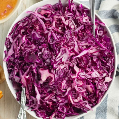 This is a picture of a bowl of red cabbage salad.