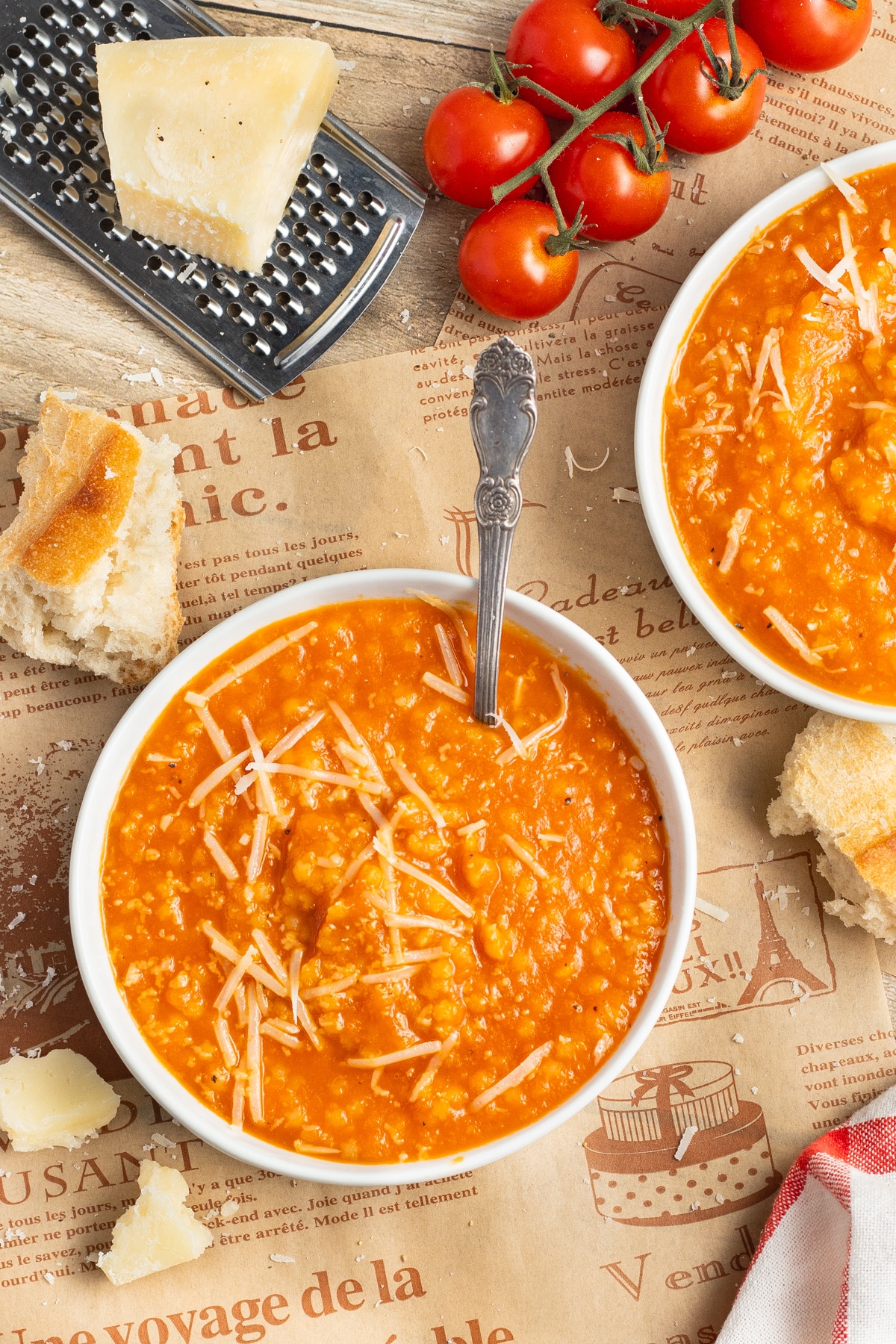This is a picture of a bowl of tomato pastina soup.