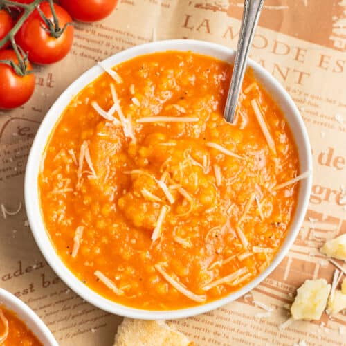 This is a picture of a bowl of tomato pastina soup.
