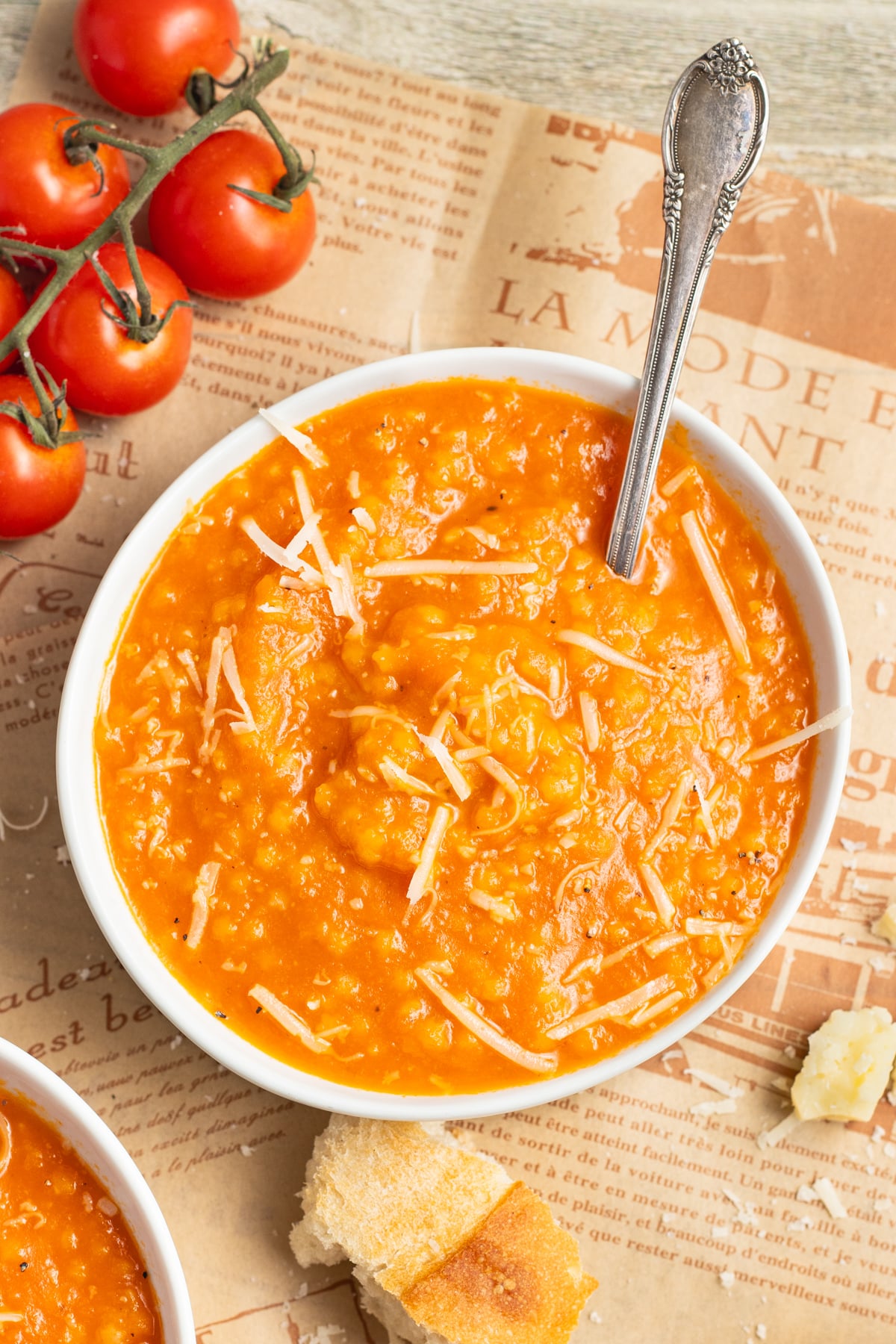 This is a picture of a bowl of tomato pastina soup.