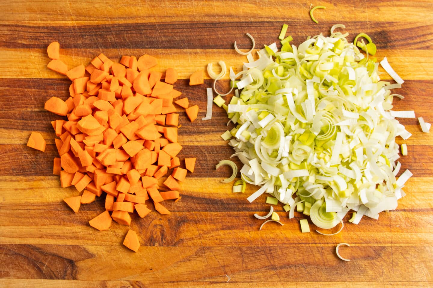 This is a picture of diced carrots and leeks.