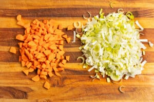 This is a picture of diced carrots and leeks.